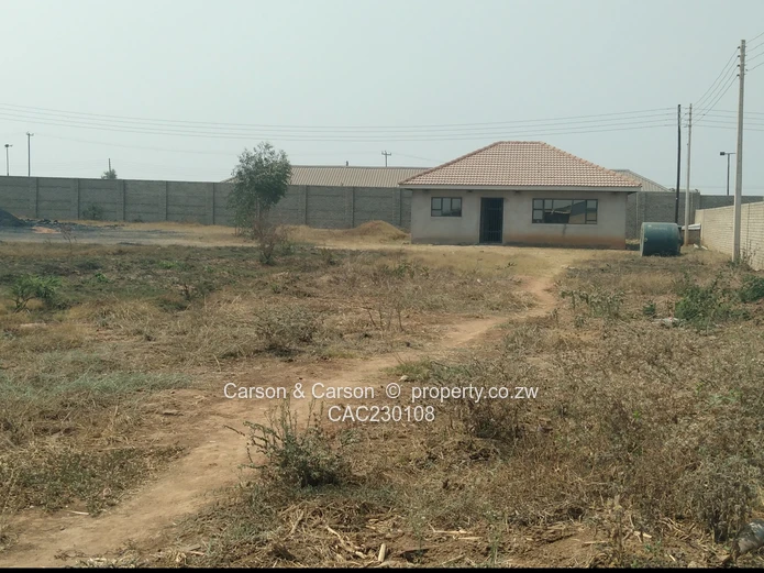 Walled 2568m² Stand on Gravel Road — Chitungwiza (Sole Mandate)