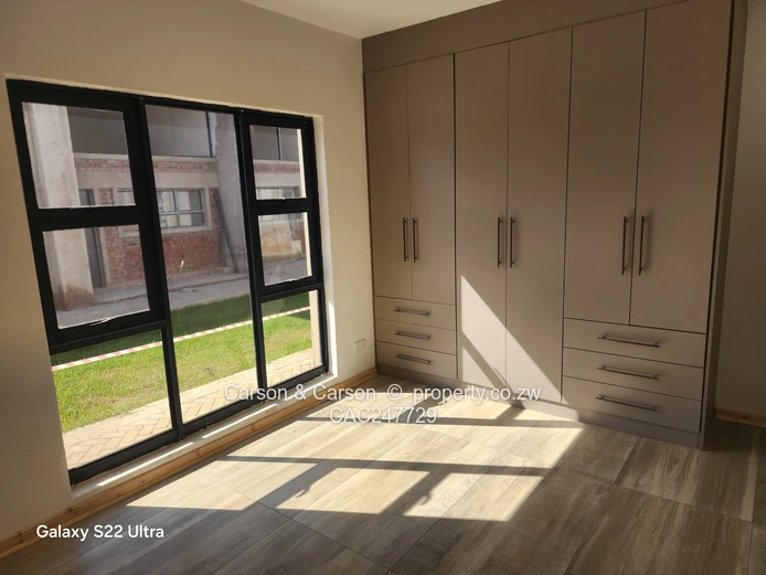 Modern 3-Bed, 2-Bath Garden Flat with Borehole – Borrowdale