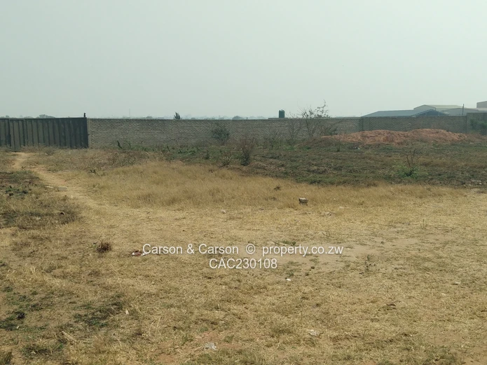 Walled 2568m² Stand on Gravel Road — Chitungwiza (Sole Mandate)