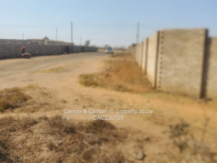 Walled 2568m² Stand on Gravel Road — Chitungwiza (Sole Mandate)
