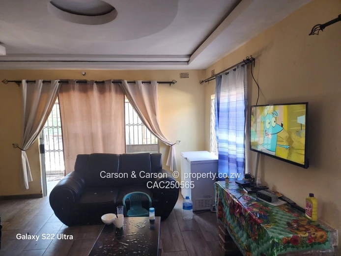 Street-Facing Brick 4BR in Seke — Water Tank & Solar