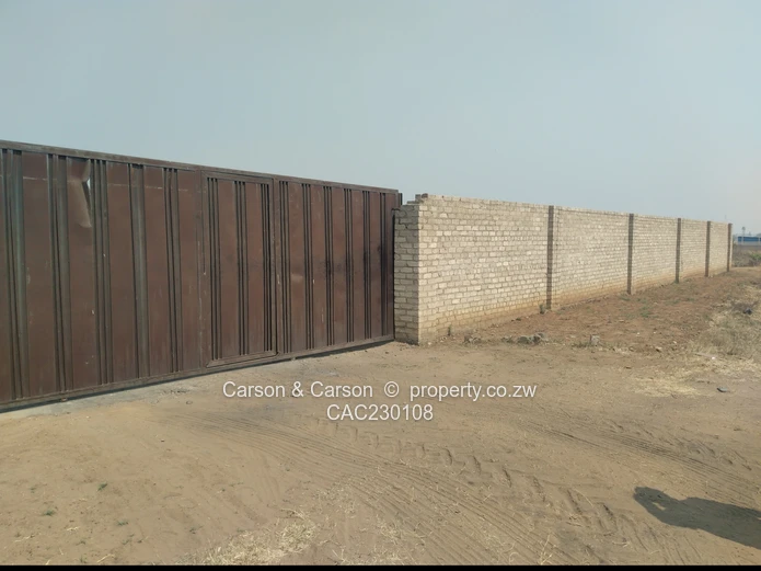 Walled 2568m² Stand on Gravel Road — Chitungwiza (Sole Mandate)