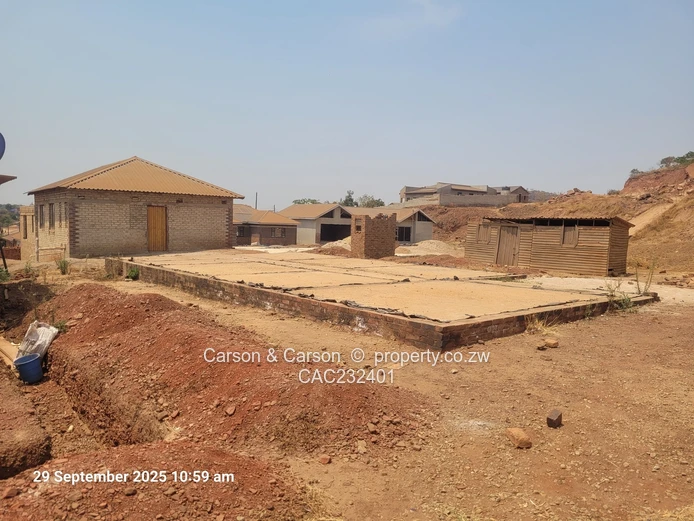 Located in the Famous Jushua Nkomo Heights. Built to slab level with approved approved plan