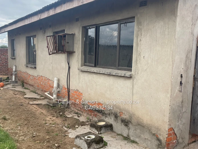 Walled 3-Bed Home with Verandah & Main Road Frontage