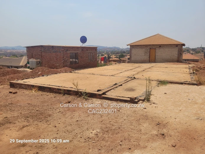 Located in the Famous Jushua Nkomo Heights. Built to slab level with approved approved plan