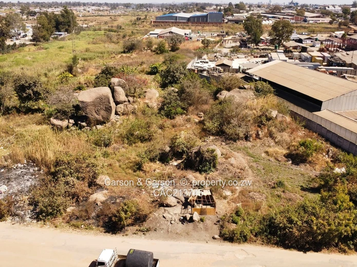 Build a mega factory or warehouse on this huge piece of land in Msasa