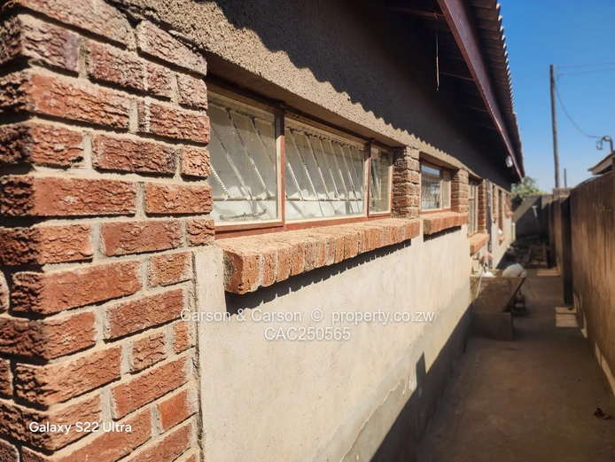 Street-Facing Brick 4BR in Seke — Water Tank & Solar