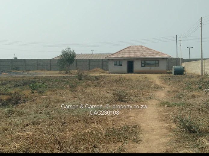 Walled 2568m² Stand on Gravel Road — Chitungwiza (Sole Mandate)