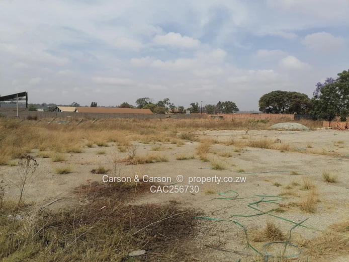 8001m² Walled Commercial Land — Main Road, Ardbennie, Harare South
