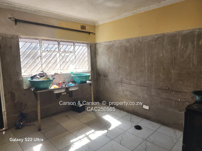 Street-Facing Brick 4BR in Seke — Water Tank & Solar