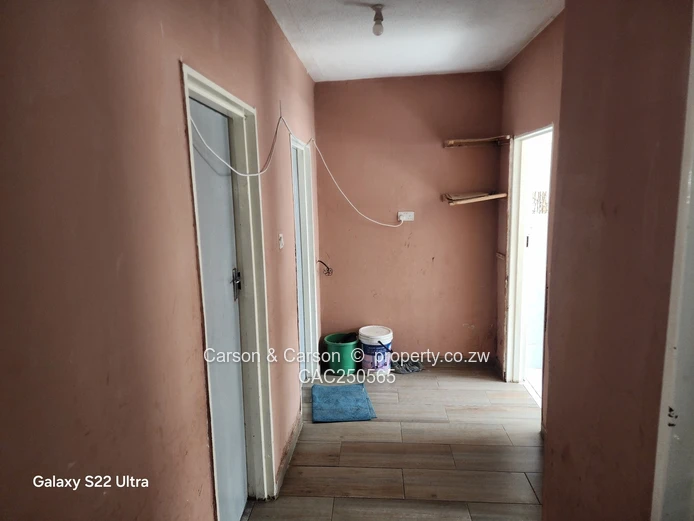 Street-Facing Brick 4BR in Seke — Water Tank & Solar