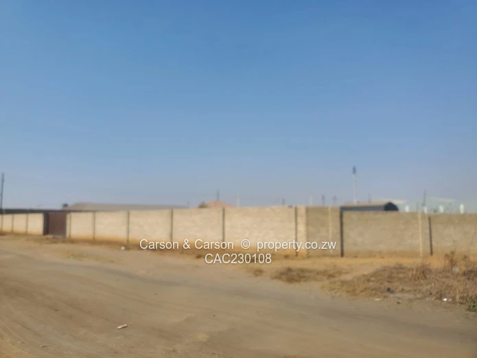 Walled 2568m² Stand on Gravel Road — Chitungwiza (Sole Mandate)