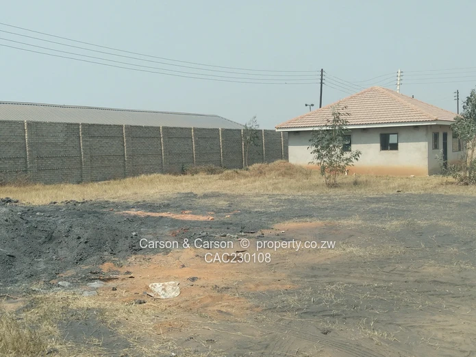 Walled 2568m² Stand on Gravel Road — Chitungwiza (Sole Mandate)