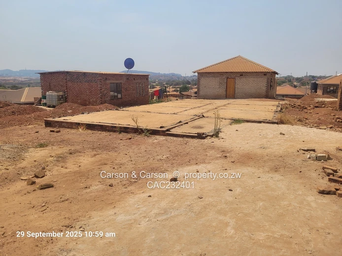 Located in the Famous Jushua Nkomo Heights. Built to slab level with approved approved plan