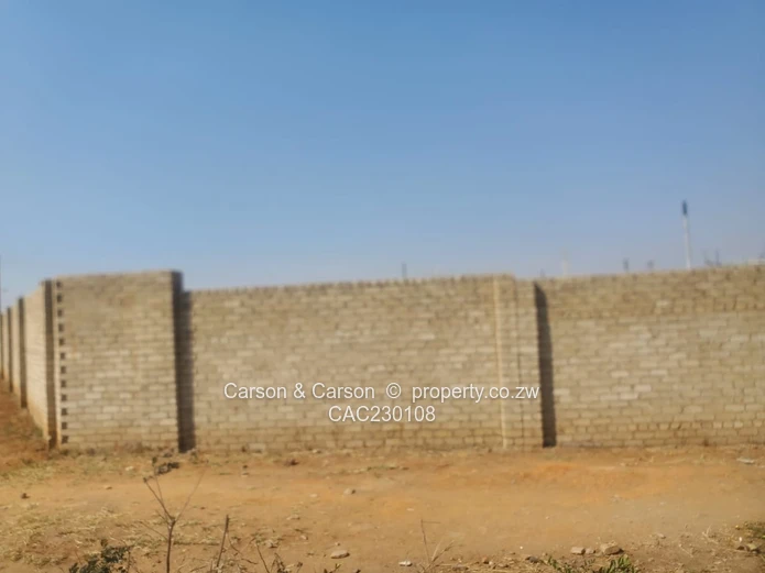 Walled 2568m² Stand on Gravel Road — Chitungwiza (Sole Mandate)