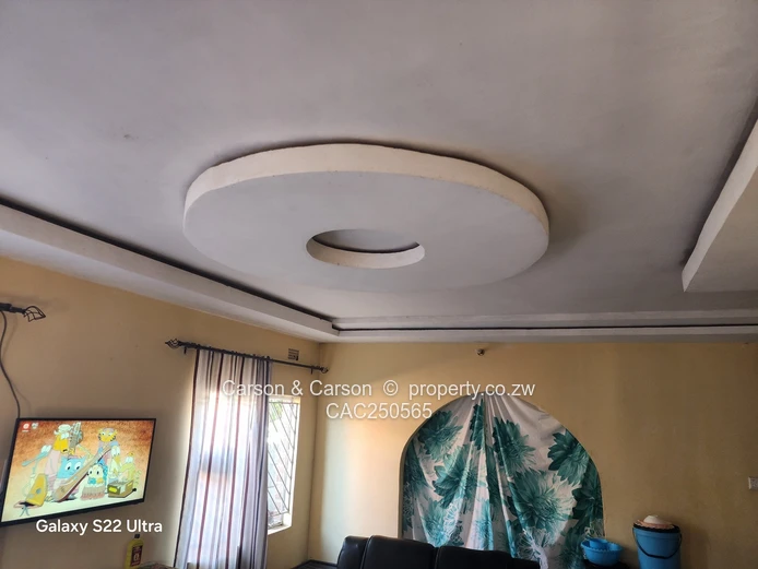 Street-Facing Brick 4BR in Seke — Water Tank & Solar