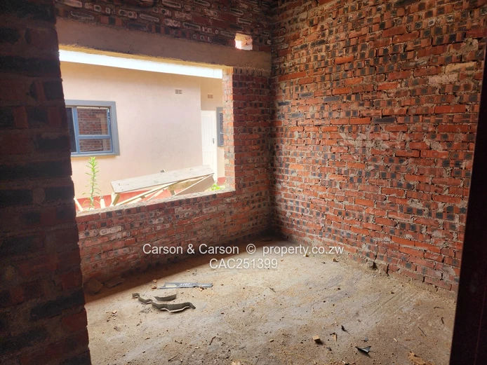 Unfinished 4-Bed Home in Arlington, Harare South — Borehole