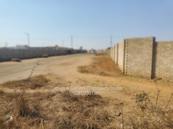 Walled 2568m² Stand on Gravel Road — Chitungwiza (Sole Mandate)