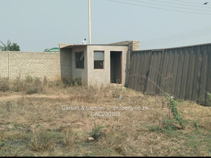 Walled 2568m² Stand on Gravel Road — Chitungwiza (Sole Mandate)