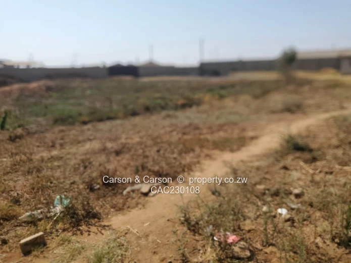 Walled 2568m² Stand on Gravel Road — Chitungwiza (Sole Mandate)